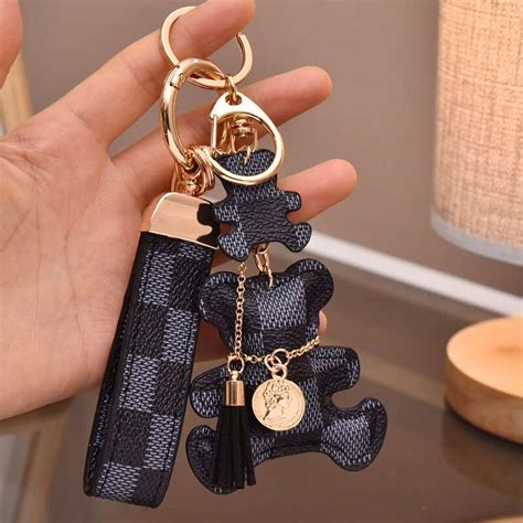 louis vuitton teddy bear keychain|louis vuitton key holder price.